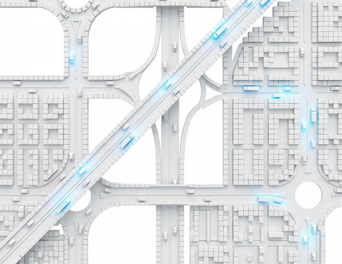 Vista aérea de una red vial NEMT con trayectorias de vehículos iluminadas